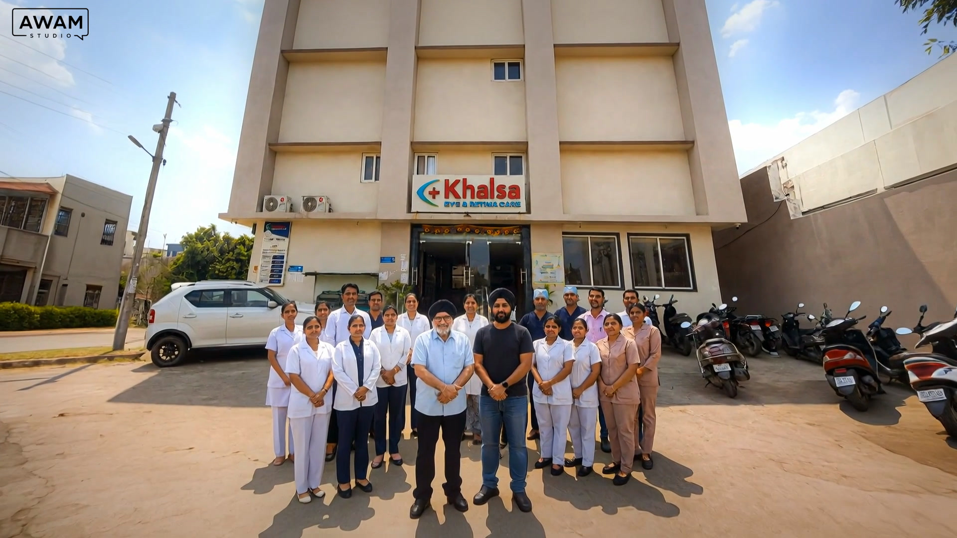 The Khalsa Eye Hospital team gathered outside the clinic in Dhamtari.